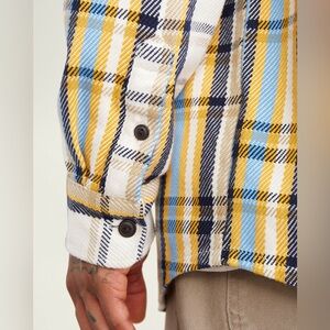 25. Roots Button Down